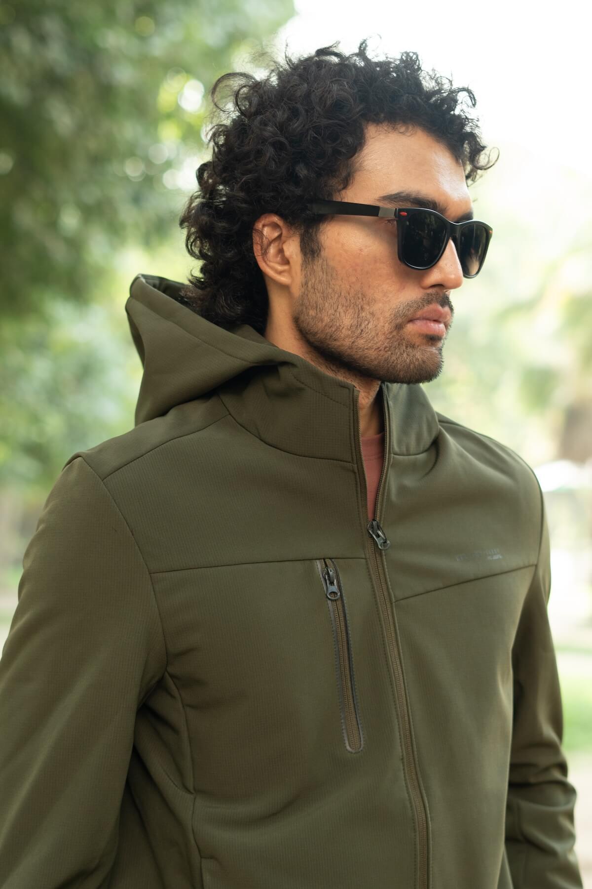 Man wearing green jacket