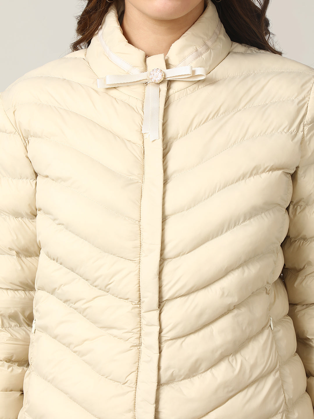 Stylish Cream Puffer Jacket with Bow Detail