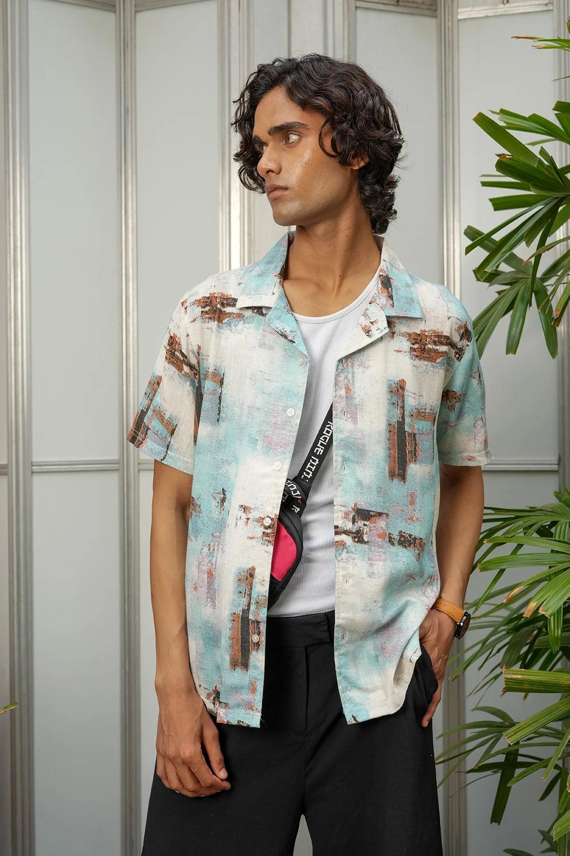 Upgrade your wardrobe with the Fort Collins Men's Blue abstract Print Open Collar Casual Shirt. Available online for purchase from anywhere in India.