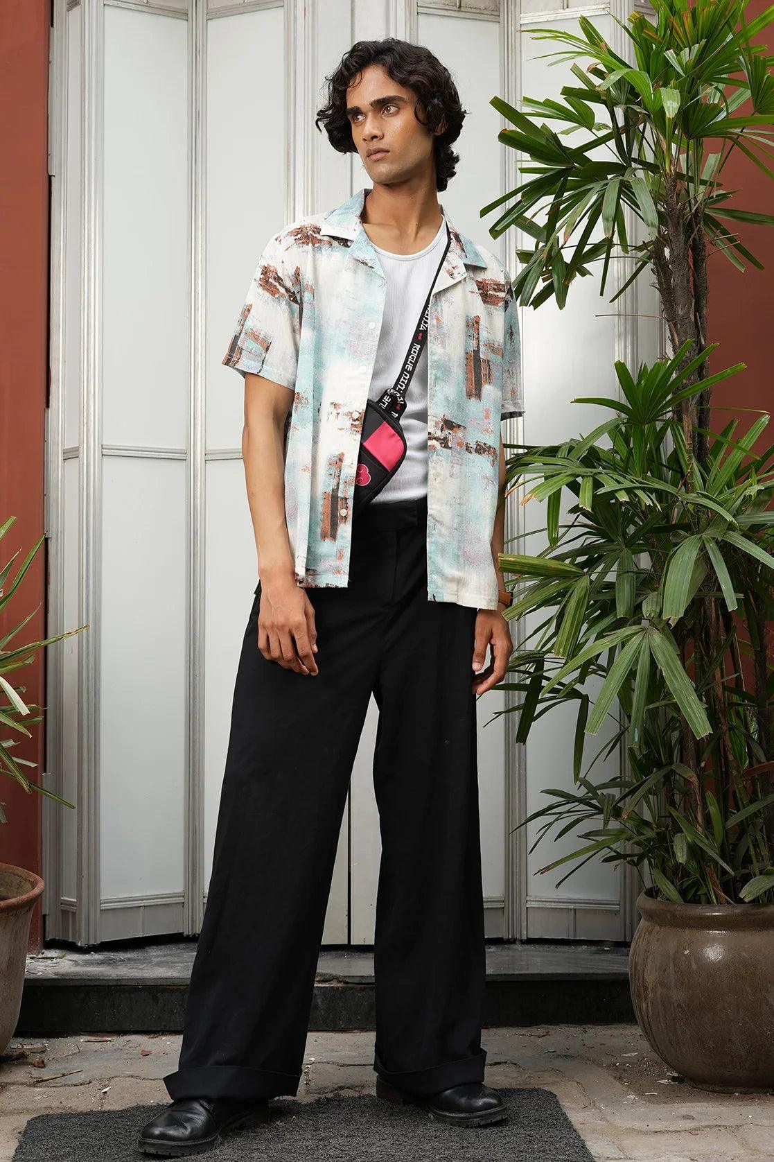 Elevate your wardrobe with the Fort Collins Men's Blue abstract Print Open Collar Casual Shirt, available for online purchase from anywhere in India. Stay on-trend with this stylish option.