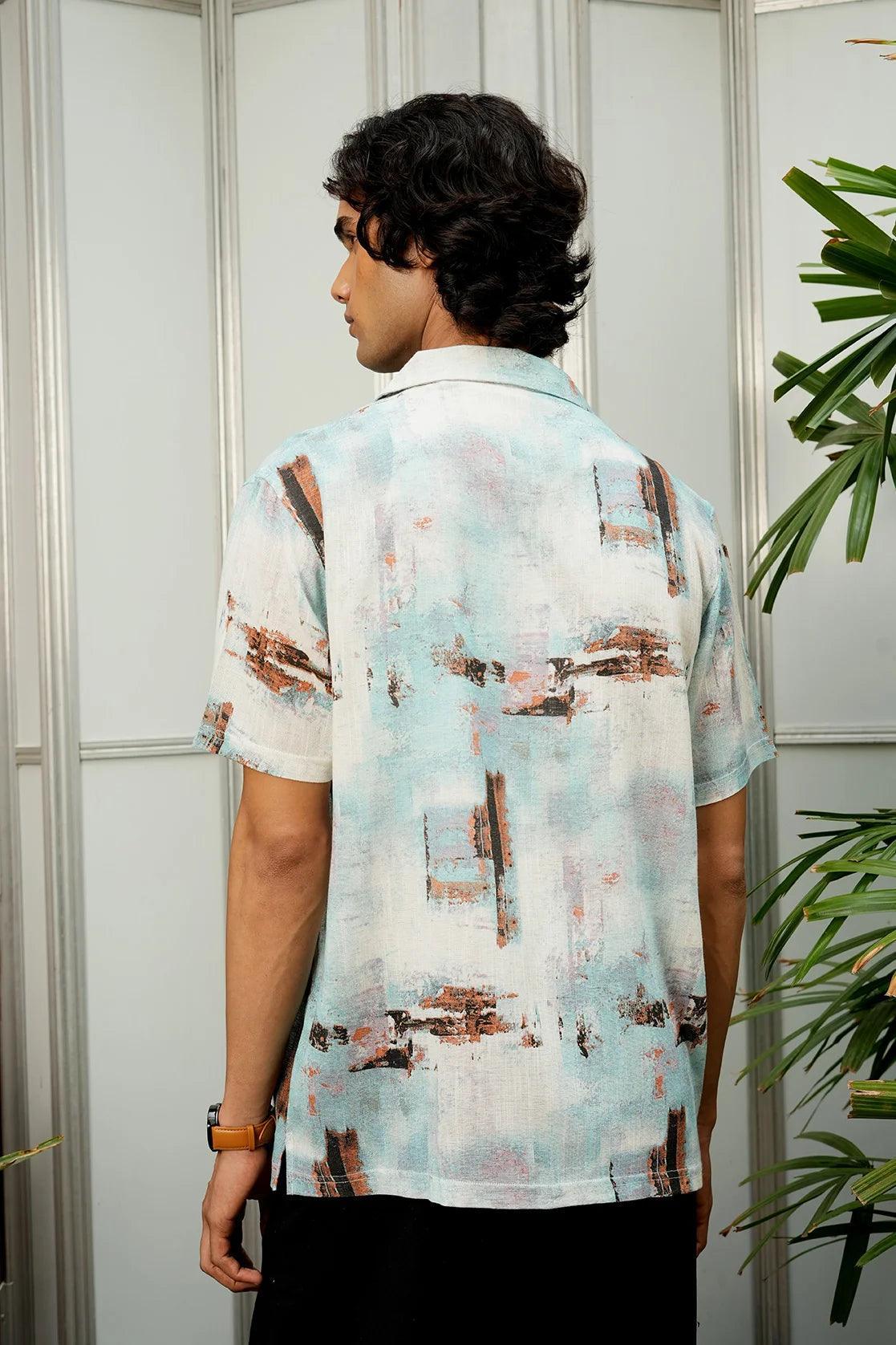 Improve your wardrobe with the Men's Blue Abstract Print Open Collar Casual Shirt from Fort Collins. This trendy piece is available for online purchase in India. Upgrade your style now.