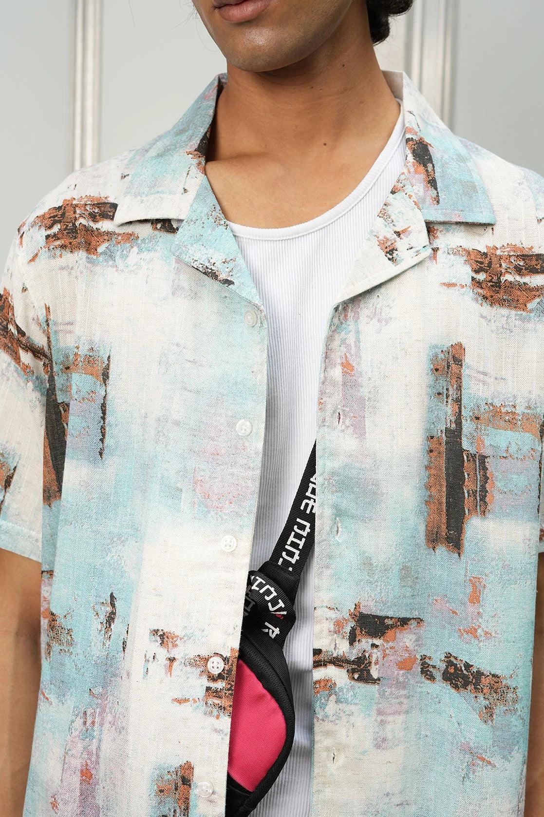 Elevate your wardrobe with the Fort Collins Men's Blue abstract Print Open Collar Casual Shirt, available for purchase online from anywhere in India. Stay on trend and shop now.