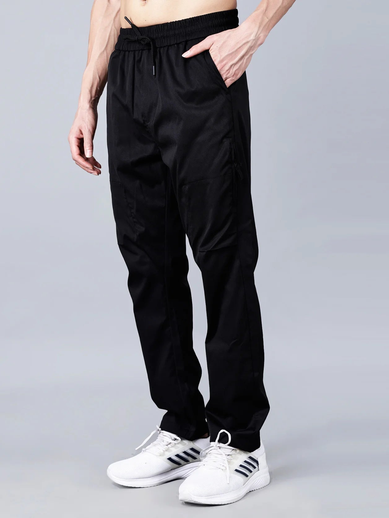 Fort Collins black cargo track pants for men with tapered fit, zippered pockets, and stretchable cotton blend fabric – breathable and stylish joggers ideal for gym, travel, or casual wear. Perfect men's trackpants for all-day comfort and utility. Shop online now from anywhere in India.
