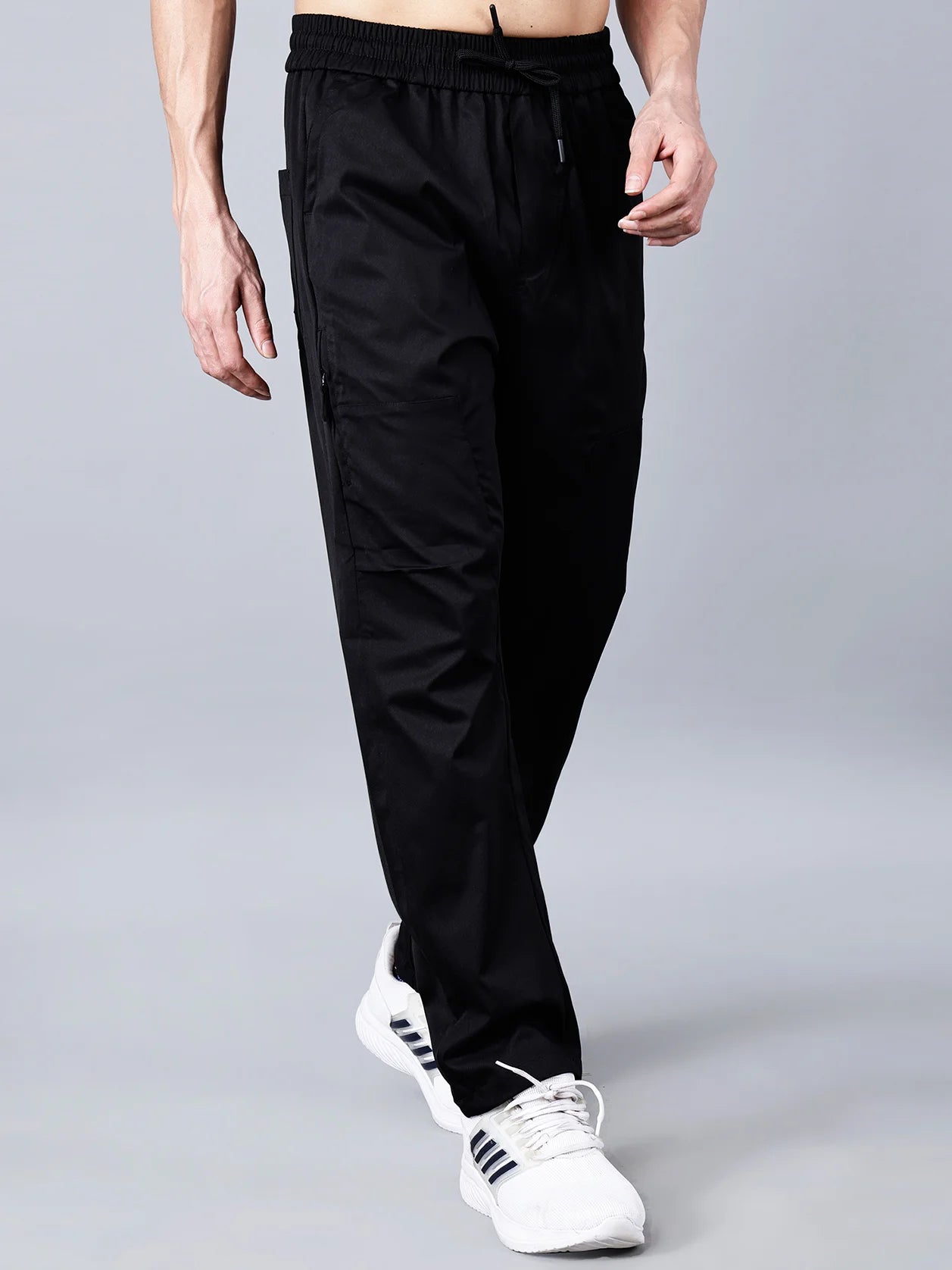 Shop online for the perfect Fort Collins men's black cargo track pants with a tapered fit, zippered pockets, and stretchable cotton blend fabric, ideal for the gym, travel, or casual wear. These stylish and breathable joggers provide all-day comfort and utility. Purchase now from anywhere in India.