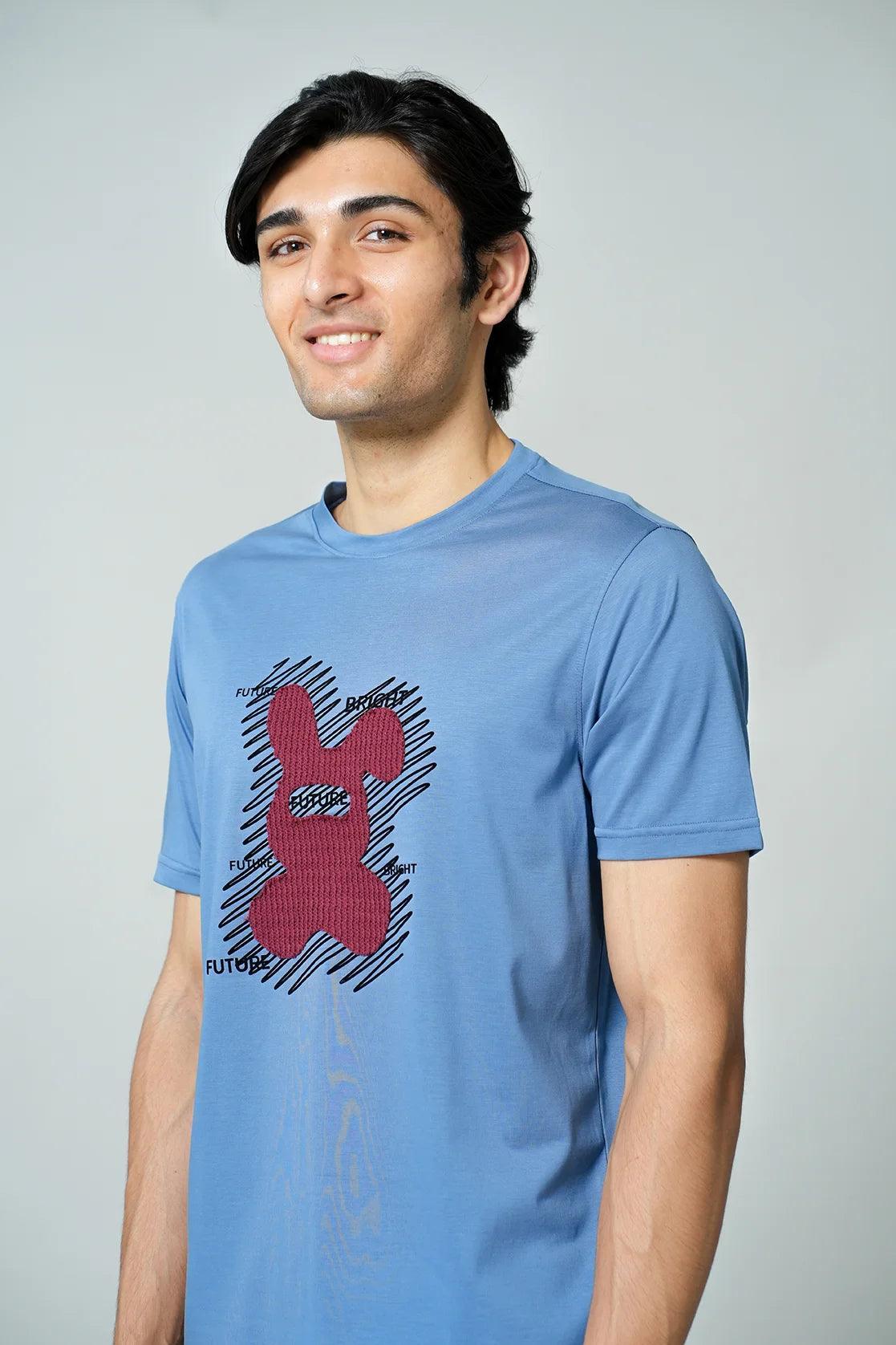 Upgrade your wardrobe with Fort Collins' Men's Blue Embroidered Graphic Print Round Neck T-Shirt, available for online purchase in India. Perfect for adding trendy style to your look.