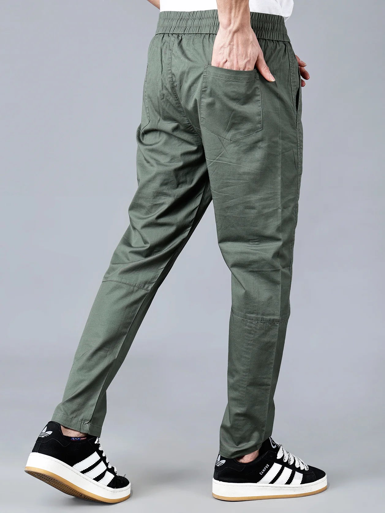 Fort Collins presents their Green Cotton Track Pants of men, designed with a smart taper fit, elastic waistband and drawstring closure, and a multi-pocket design. Perfect for casual wear, these trendy track pants are now available online in India.