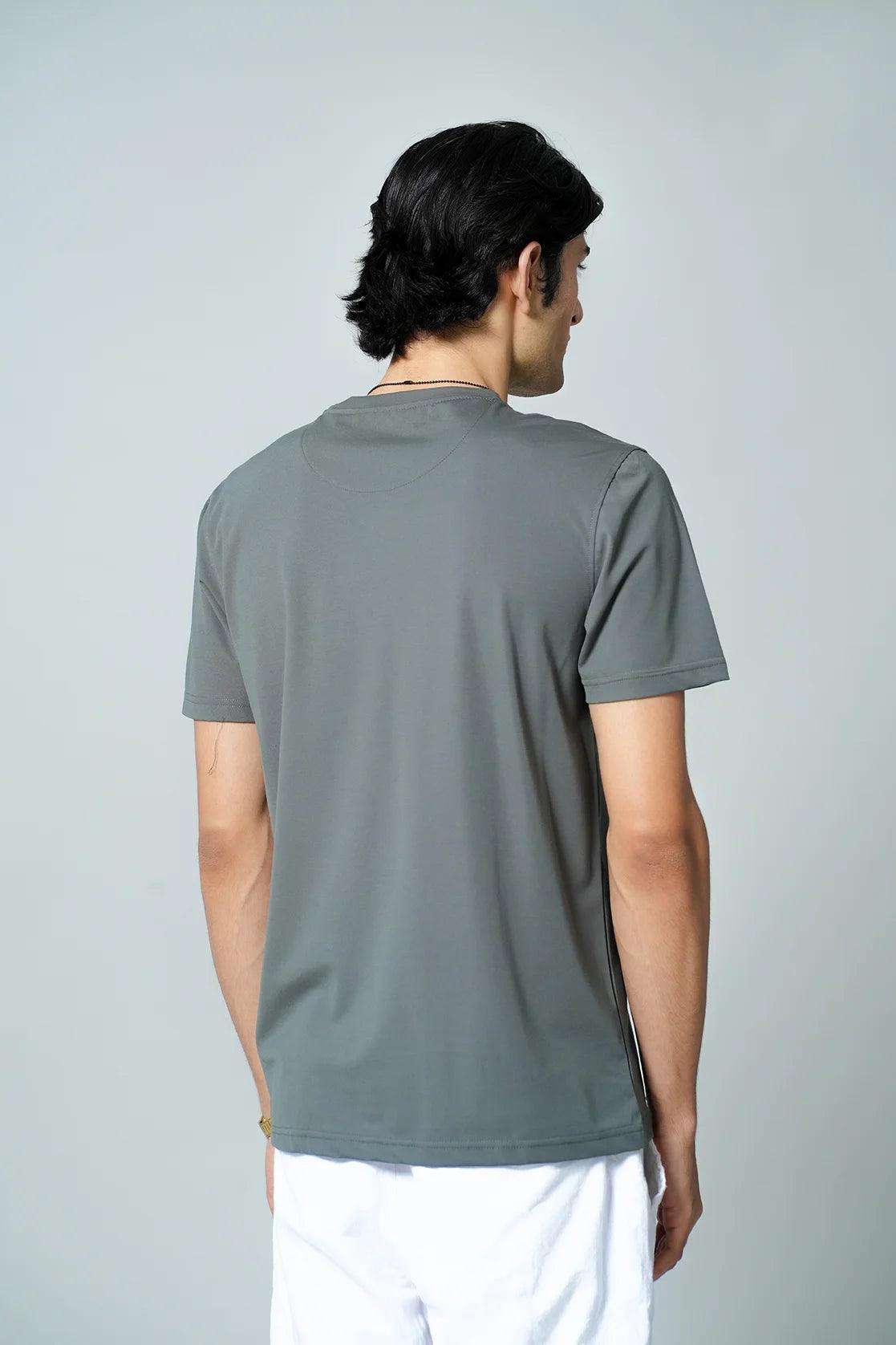 Upgrade your wardrobe with the Men's Grey Stretchable Graphic Print T-Shirt by Fort Collins. This stylish t-shirt is made with polynylon and is available for purchase online from anywhere in India.