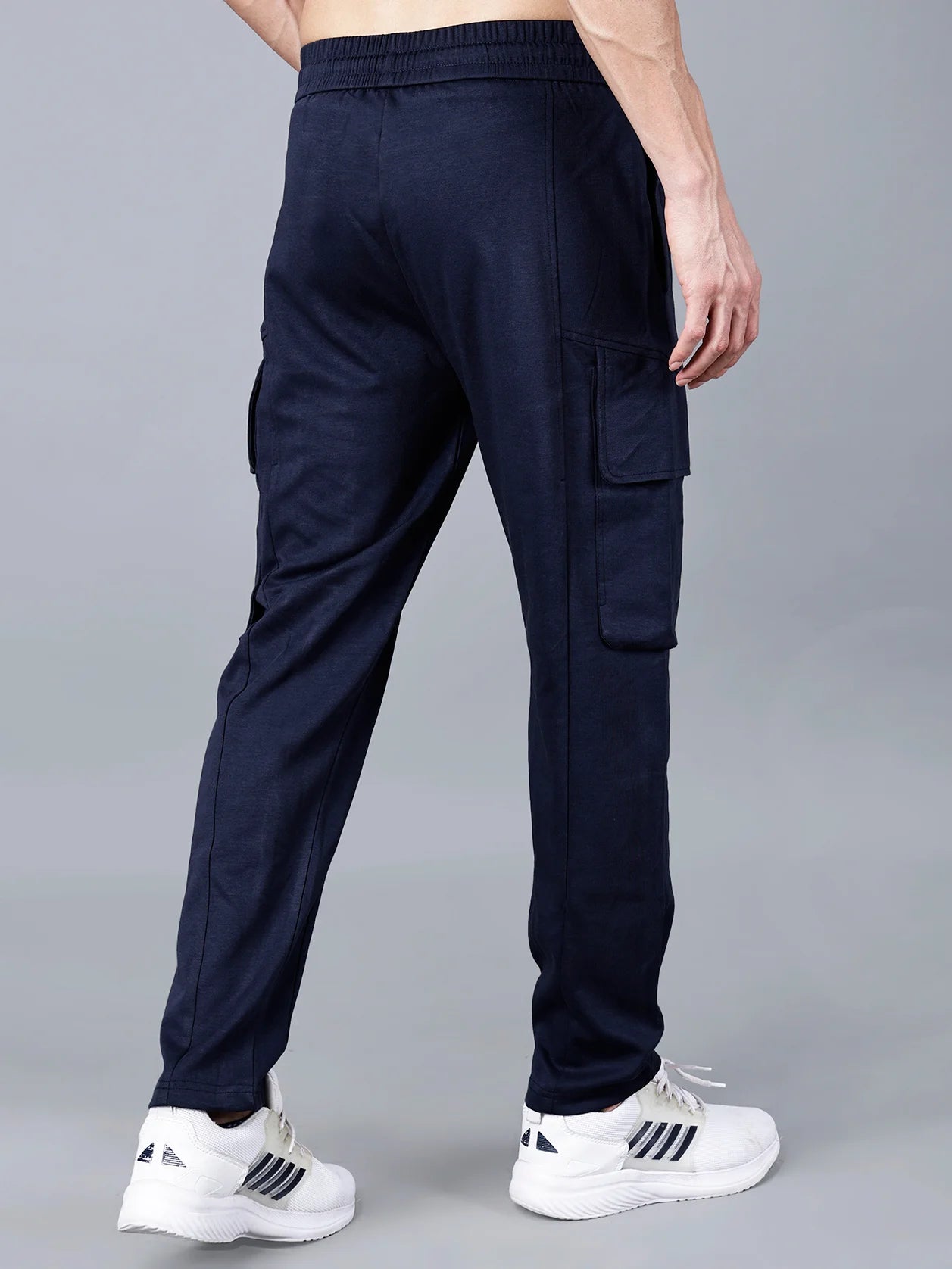 Discover the ultimate comfort and style with Fort Collins Navy Blue Cargo Track Pant for Men. Featuring elastic waistband and structured cotton-polyester fabric, these pants are perfect for everyday wear and will give a streetwear-ready touch to your look. Shop online now from anywhere in India