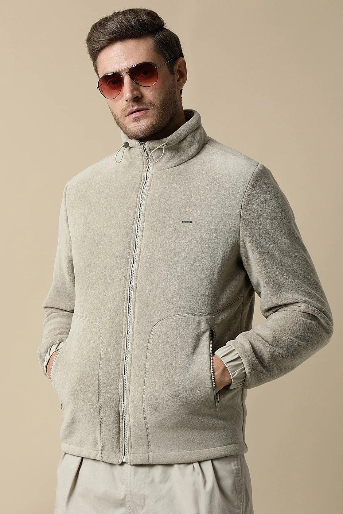Introducing the Men's Beige Fleece Jacket with Zip-Up Front by Fort Collins - the perfect addition to your wardrobe. Available online in India, elevate your style with this trendy piece