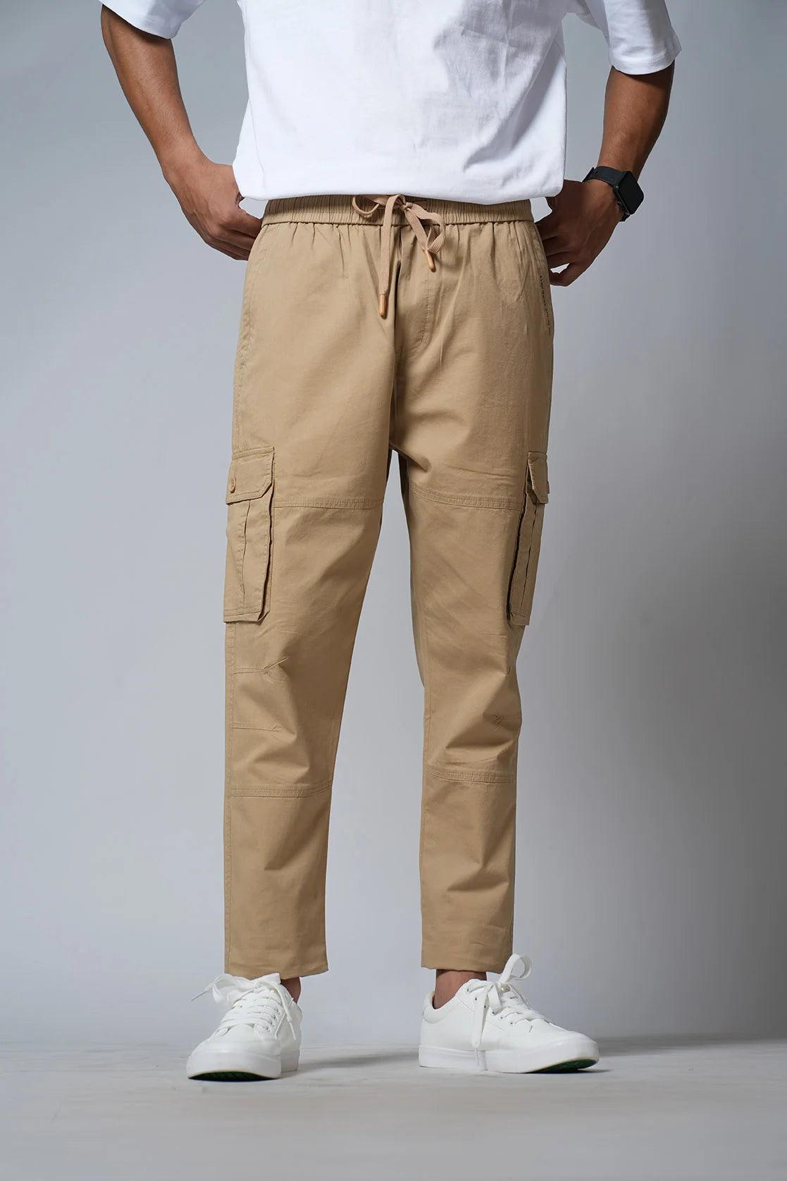 Discover the Fort Collins Men's Beige Smart Fit Track Pant with Multi Pockets, available for purchase online in India from a reputable merchant.