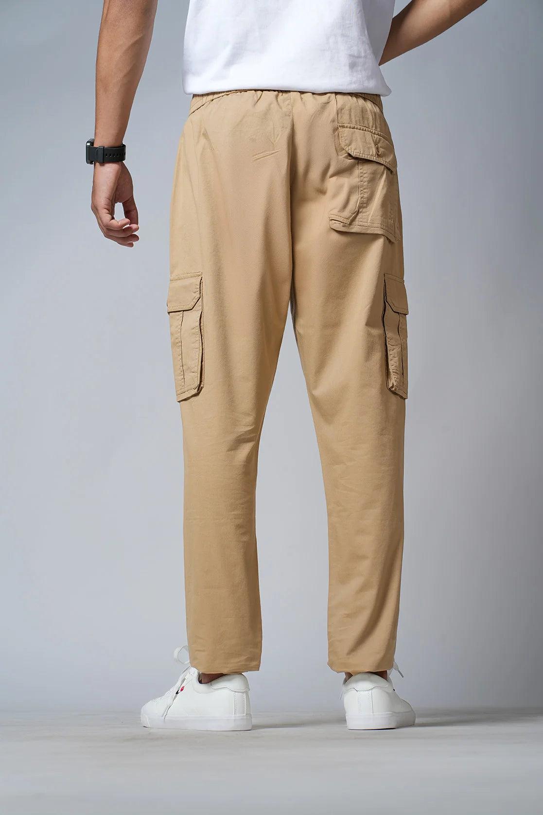 Discover Fort Collins Men's Beige Smart Fit Track Pant with Multi Pockets, exclusively available online in India.