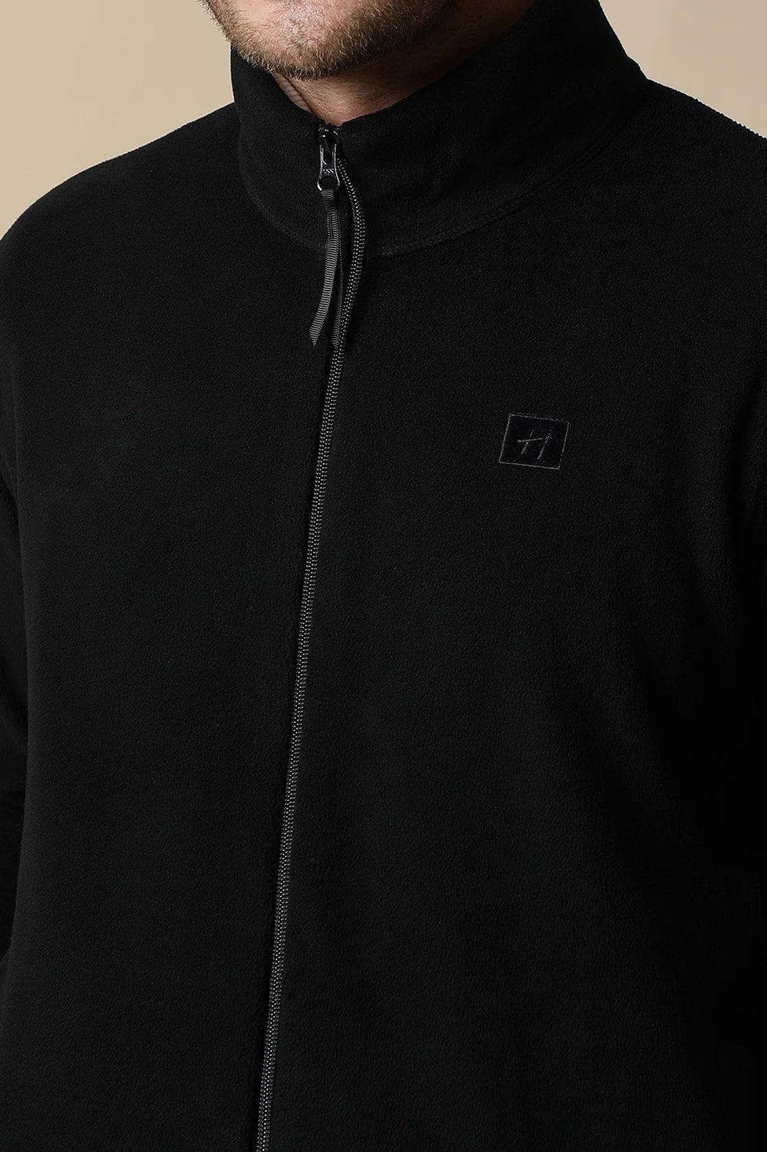 Discover the latest in men's fashion with the Black Full-Zip Fleece Sweatshirt from Fort Collins. Upgrade your wardrobe with this trendy staple, available for online purchase anywhere in India.