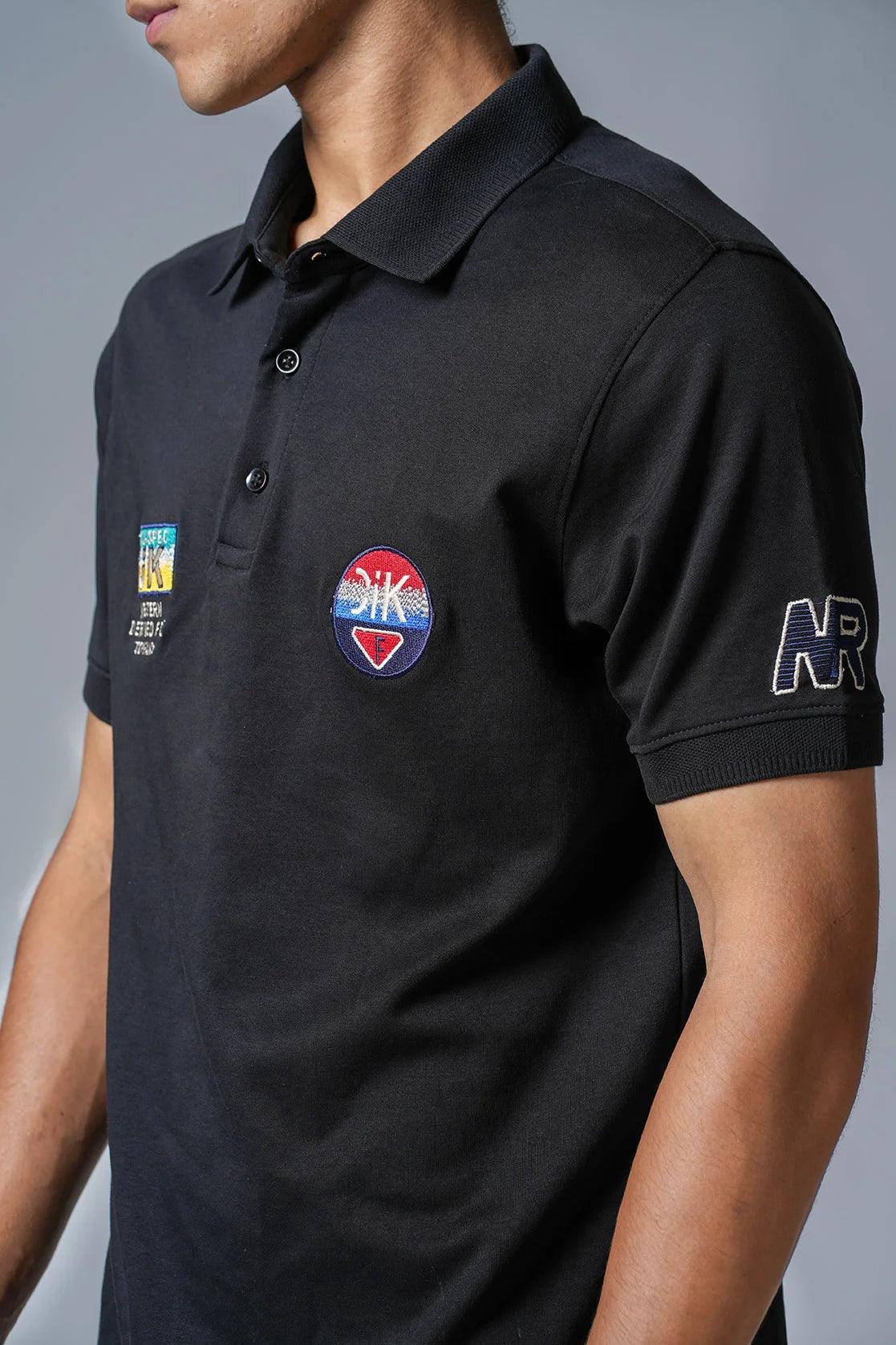 Upgrade your wardrobe with the stylish Men's Black Polo Collar T-Shirt by Fort Collins. It features embroidery patches and can be purchased online from anywhere in India.
