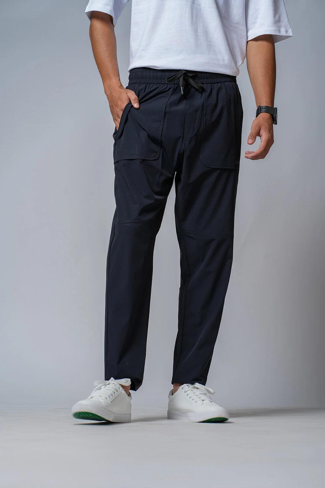 Experience maximum comfort and style with the Fort Collins Men's Black Regular Fit Polyester-Lycra Track Pant, available online in India. This durable garment features zipper pockets and a sleek design, perfect for any active lifestyle.