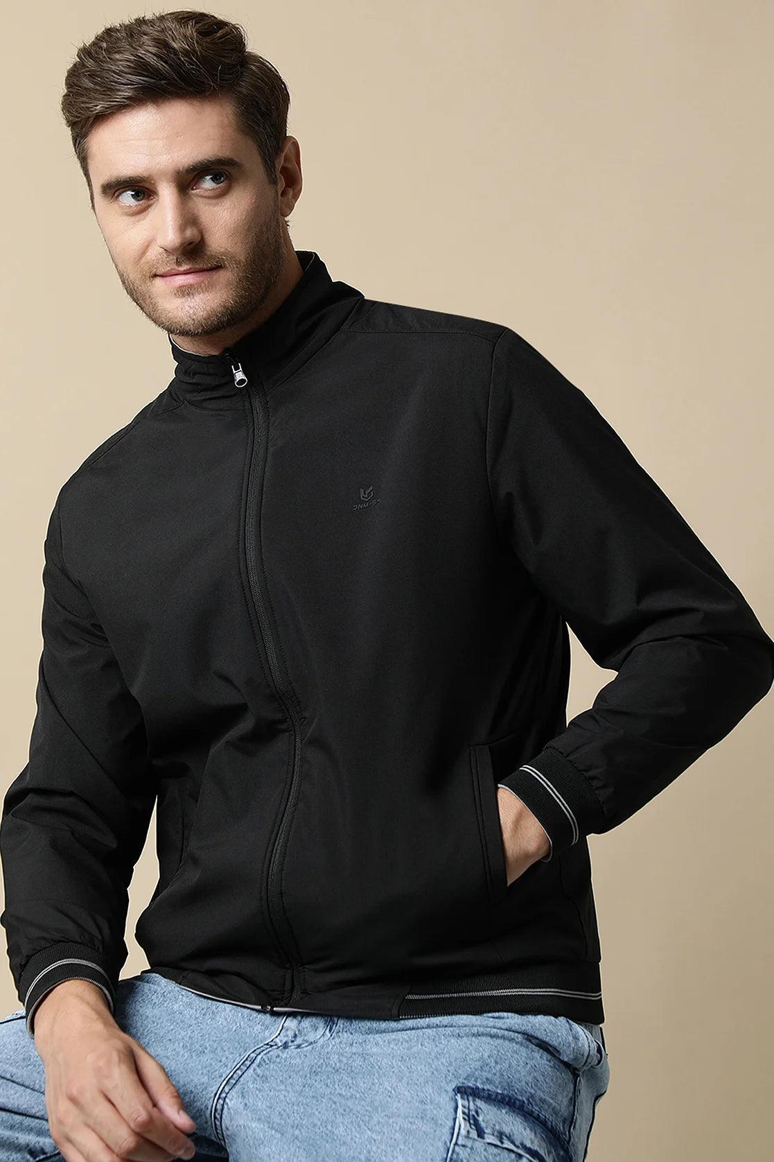 Experience the latest in stylish and functional fashion with the Fort Collins Men's Black Reversible Windbreaker, featuring a sleek dual-tone design. Shop online from anywhere in India for this must-have addition to your wardrobe.