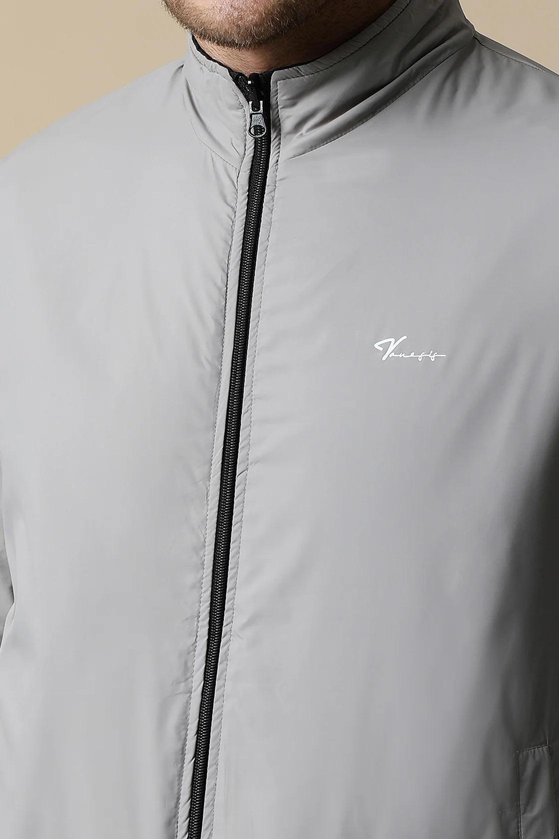Discover the stylish versatility of Fort Collins Men's Black Reversible Windbreaker with Dual-Tone Design. Shop now for a fashion-forward wardrobe update, available online throughout India.