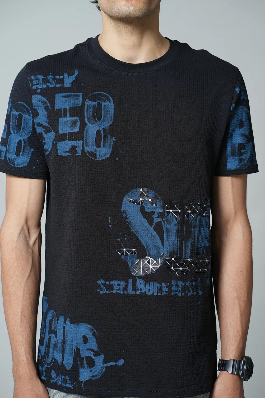 Upgrade your wardrobe with the Fort Collins Men's Black Structured Cotton-Lycra Graphic T-Shirt. Shop online now for a trendy look from anywhere in India.