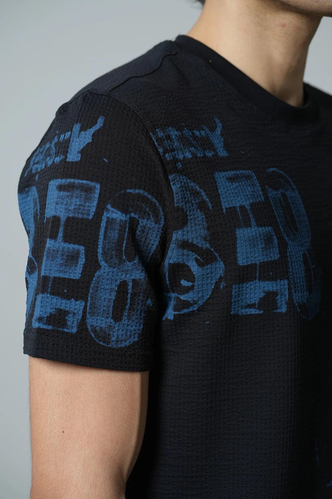 Enhance your wardrobe with the Men's Black Structured Cotton-Lycra Graphic T-Shirt by Fort Collins, available for online purchase in India. Stay stylish and comfortable at the same time with this trendy piece of clothing.