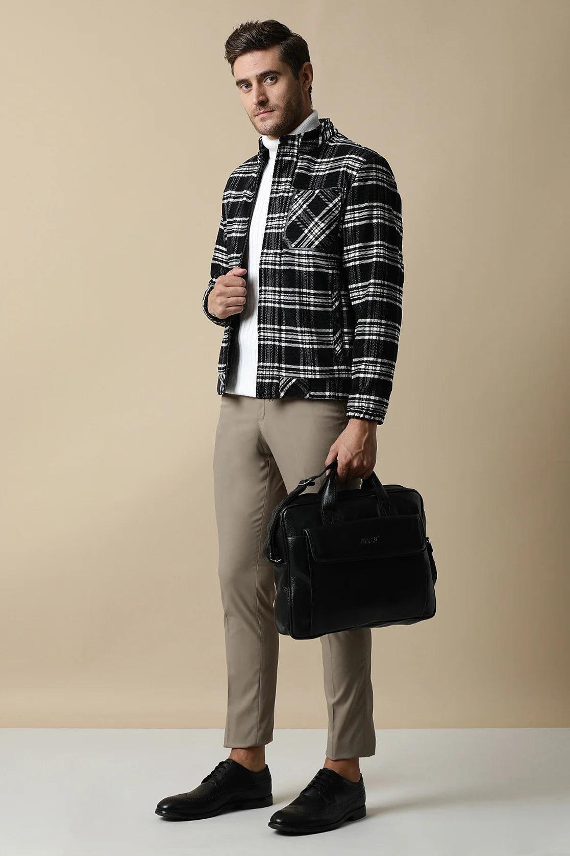Upgrade your wardrobe with the Fort Collins Men's Black Tweed Plaid Jacket. This stylish and trendy jacket features a quilted lining, perfect for any fashion-forward man. Shop online now from anywhere in India to elevate your look.