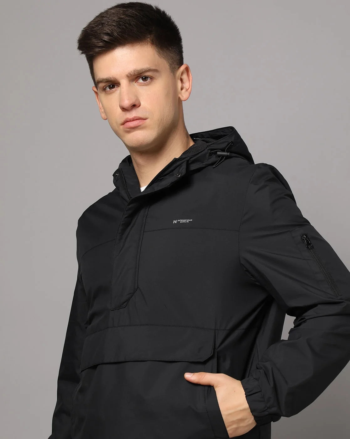 Upgrade your wardrobe with the Fort Collins Men's Black Windbreaker Jacket. This stylish jacket features an adjustable hood and mesh-net lining, perfect for any weather. Shop now online from anywhere in India.