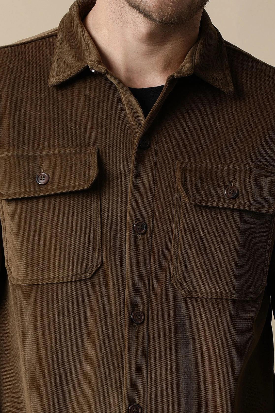 The Men's Brown Corduroy Shacket with Chest Pockets from Fort Collins is available for purchase online from anywhere in India.