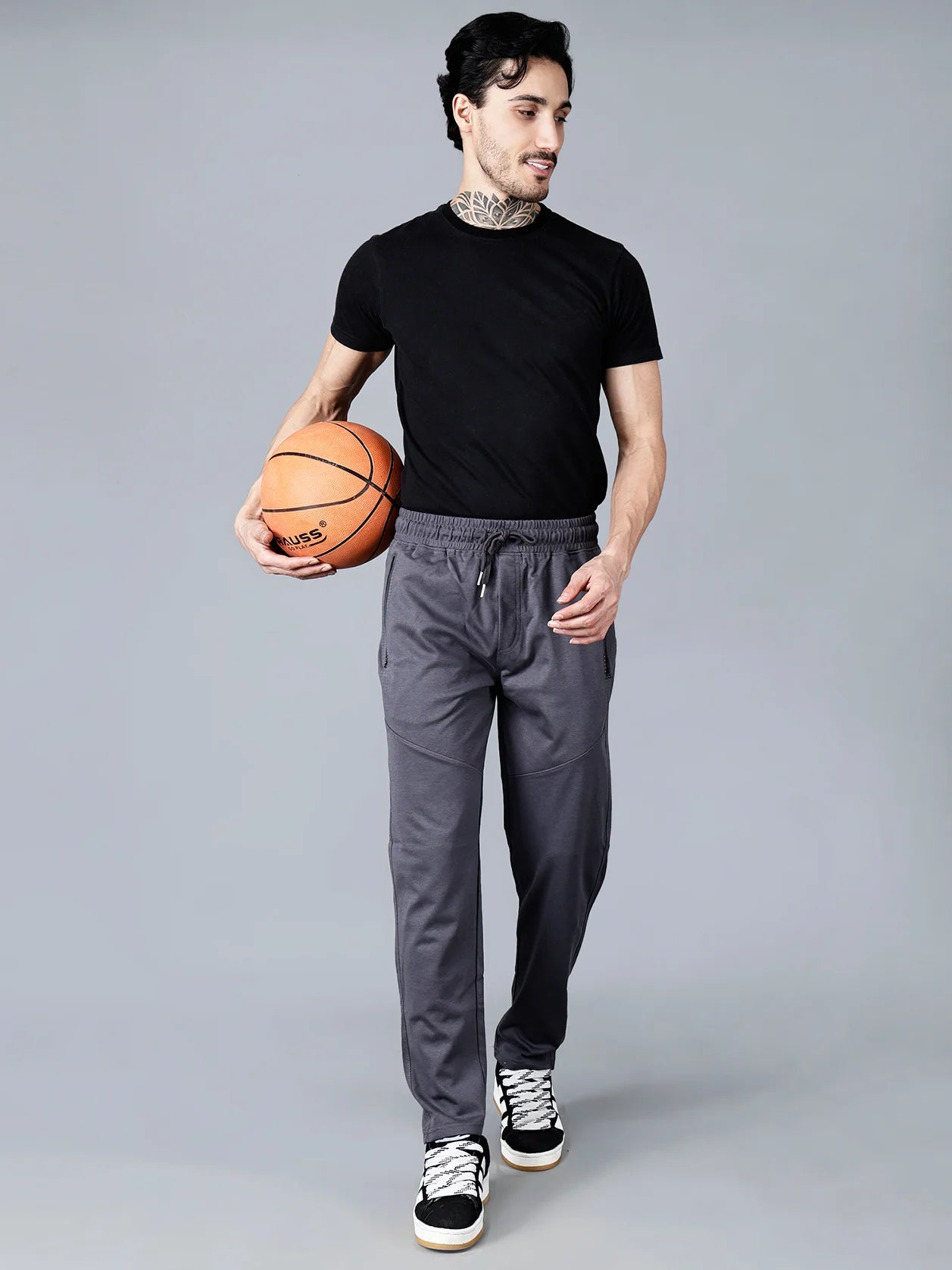 Shop for a stylish wardrobe from anywhere in India with our Men's Charcoal Grey Structured Track Pant, featuring zipper pockets and a fashionable fit.