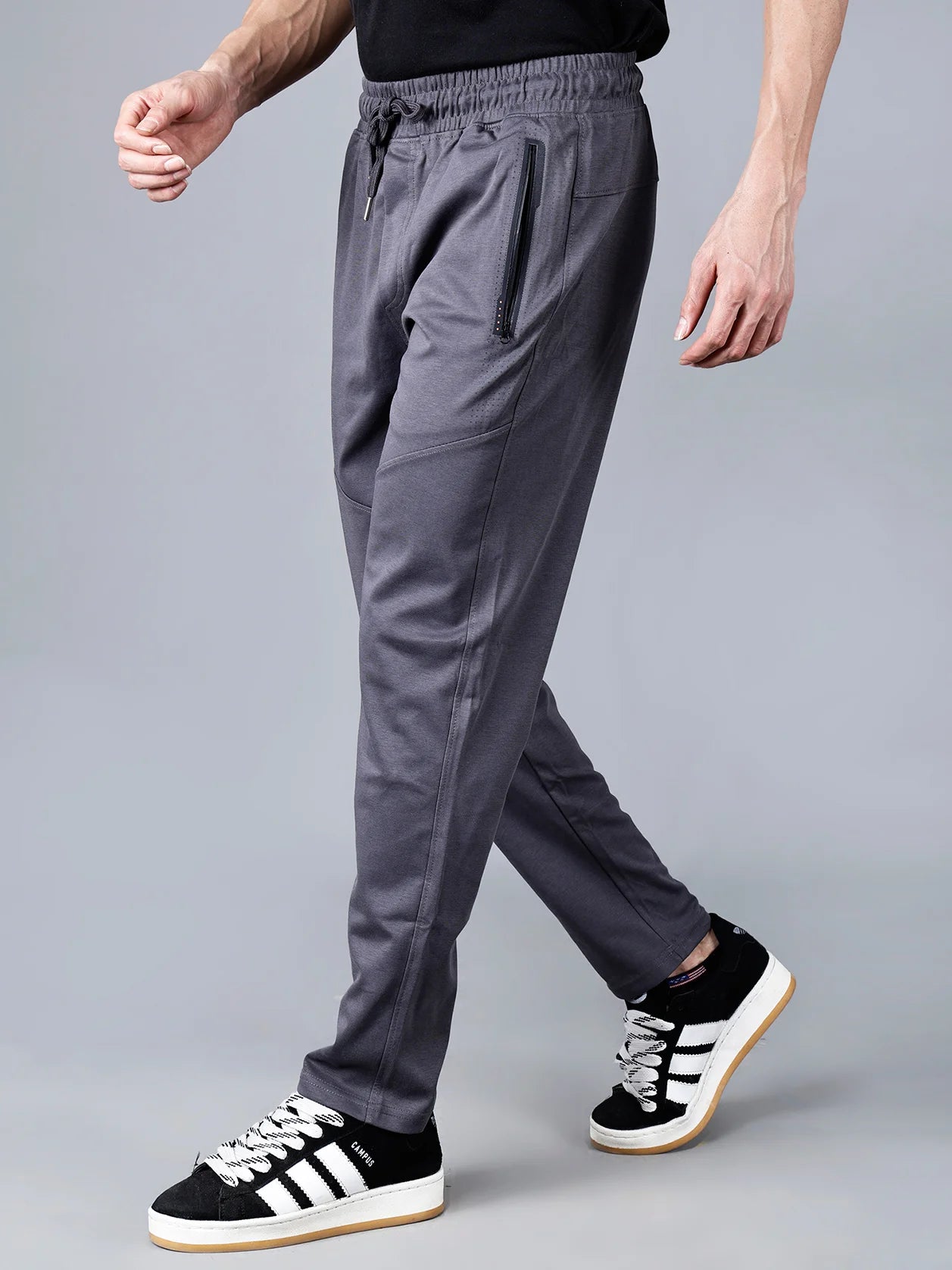 Purchase the Men's Charcoal Grey Structured Track Pant with Zipper Pockets from anywhere in India for a sleek and modern addition to your wardrobe.