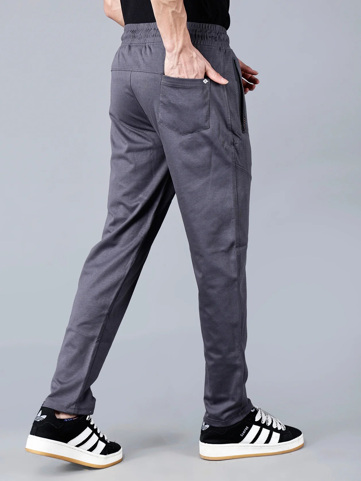 Shop for the stylish Men's Charcoal Grey Structured Track Pant with Zipper Pockets online, available for purchase in India.