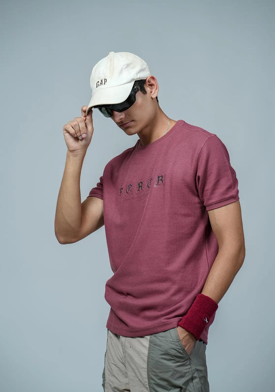 Shop the Men's Maroon Embossed Print Round Neck Short Sleeve T-Shirt by Fort Collins, available online in India.