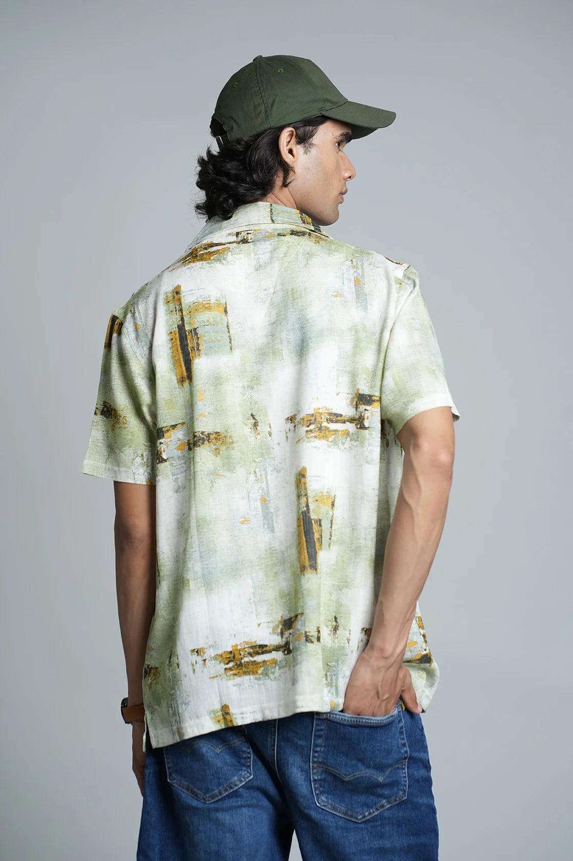 Discover a stylish update for your wardrobe with our Men's Green Abstract Print Open Collar Casual Shirt, available for purchase online from anywhere in India! Shop now and elevate your fashion game with Fort Collins.