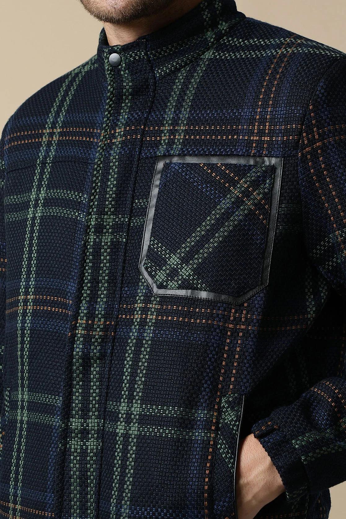 Elevate your fashion game with the stylish Men's Green Tweed Jacket from Fort Collins. Its quilted lining offers both comfort and warmth, making it the perfect addition to your wardrobe. Available for online purchase in India.