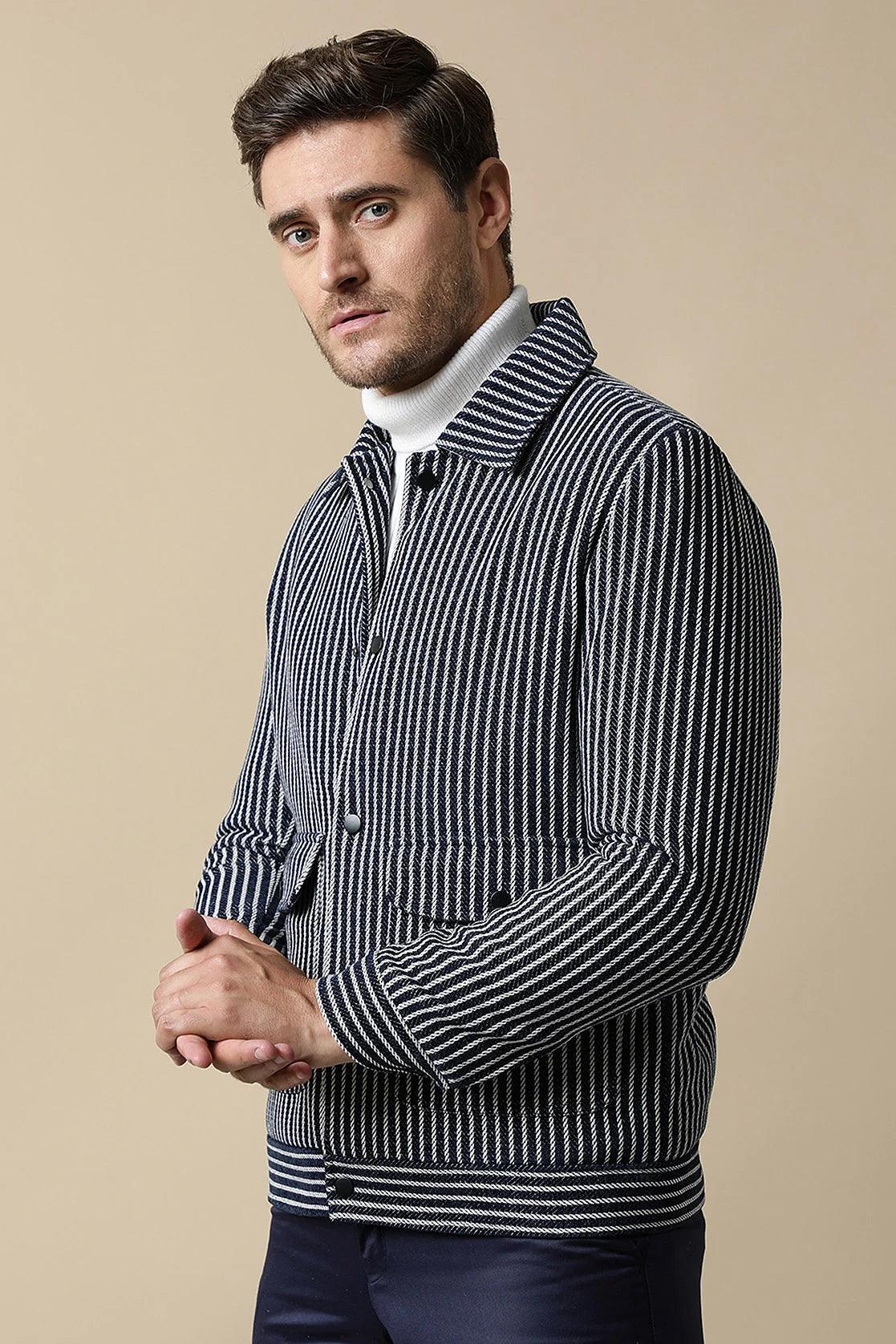 Get a trendy wardrobe from anywhere in India with this Men's Navy Striped Tweed Jacket, designed by Fort Collins. Featuring dual pockets, it is perfect for any stylish man. Shop now online and upgrade your wardrobe today.