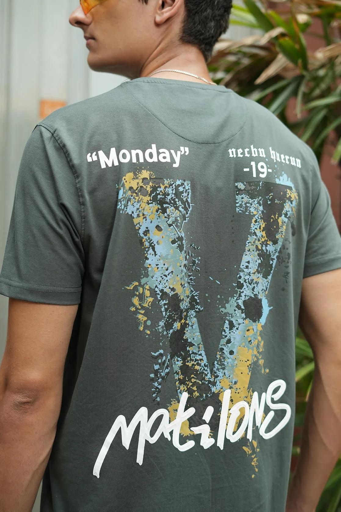 This T-shirt, designed for men by Fort Collins, features a black round neck with a graphic print and embroidery.