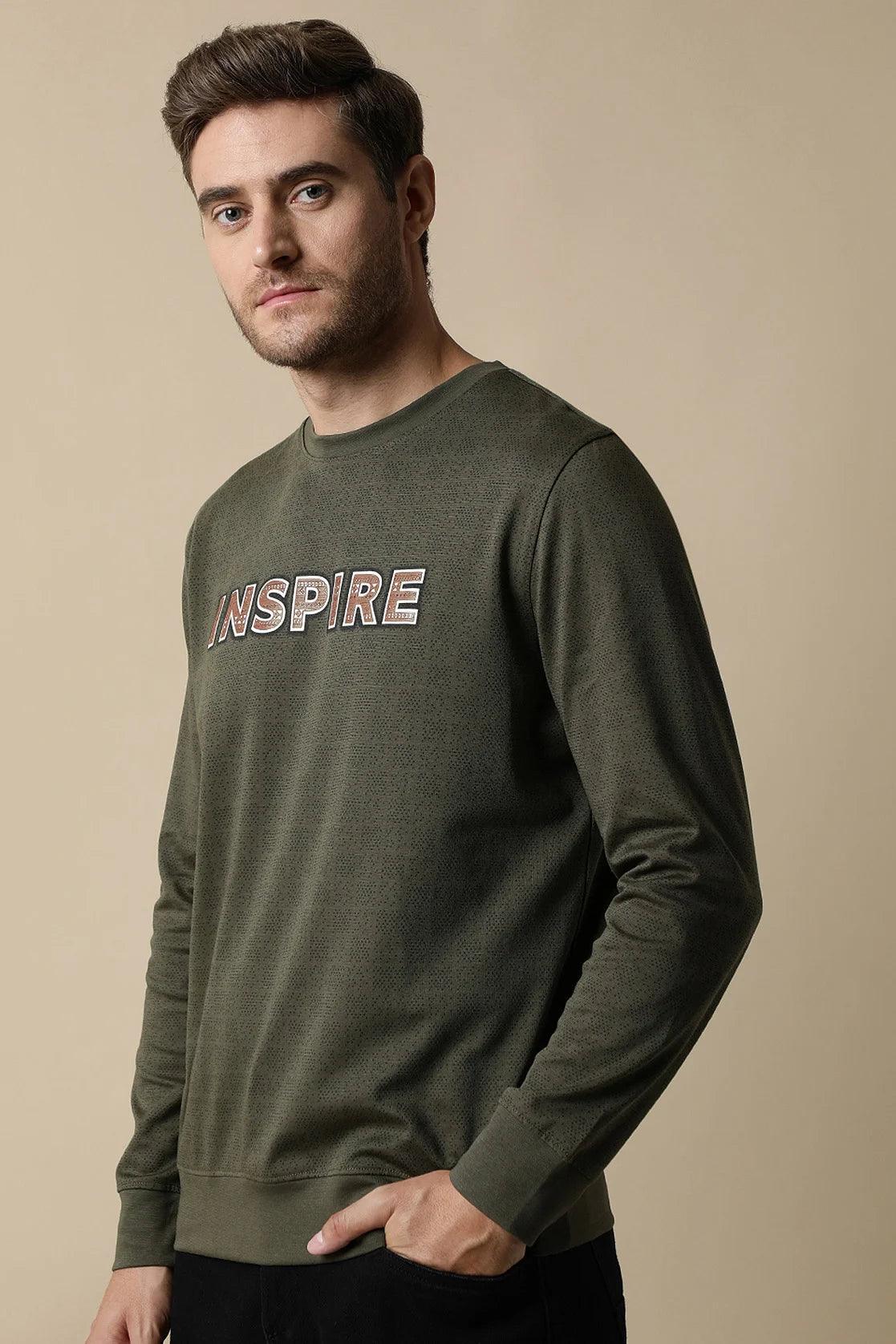 Upgrade your wardrobe with the Men's Olive Round Neck Sweatshirt from Fort Collins. Available online throughout India for a fashionable addition to your collection.