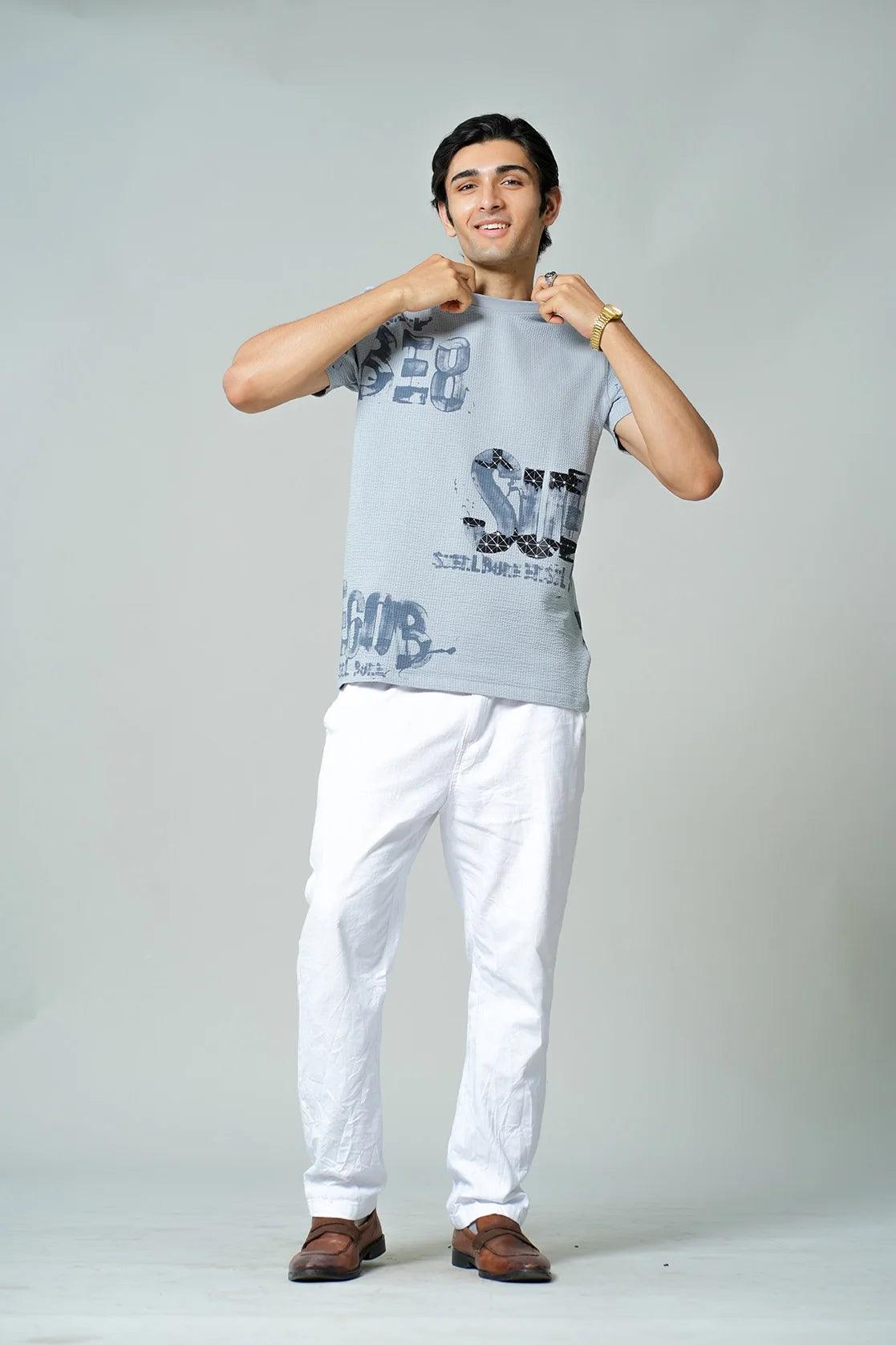 Upgrade your wardrobe with our Men's Sky Blue Structured Cotton-Lycra T-shirt with a modern print design. This round-neck t-shirt is now available for purchase online in India.