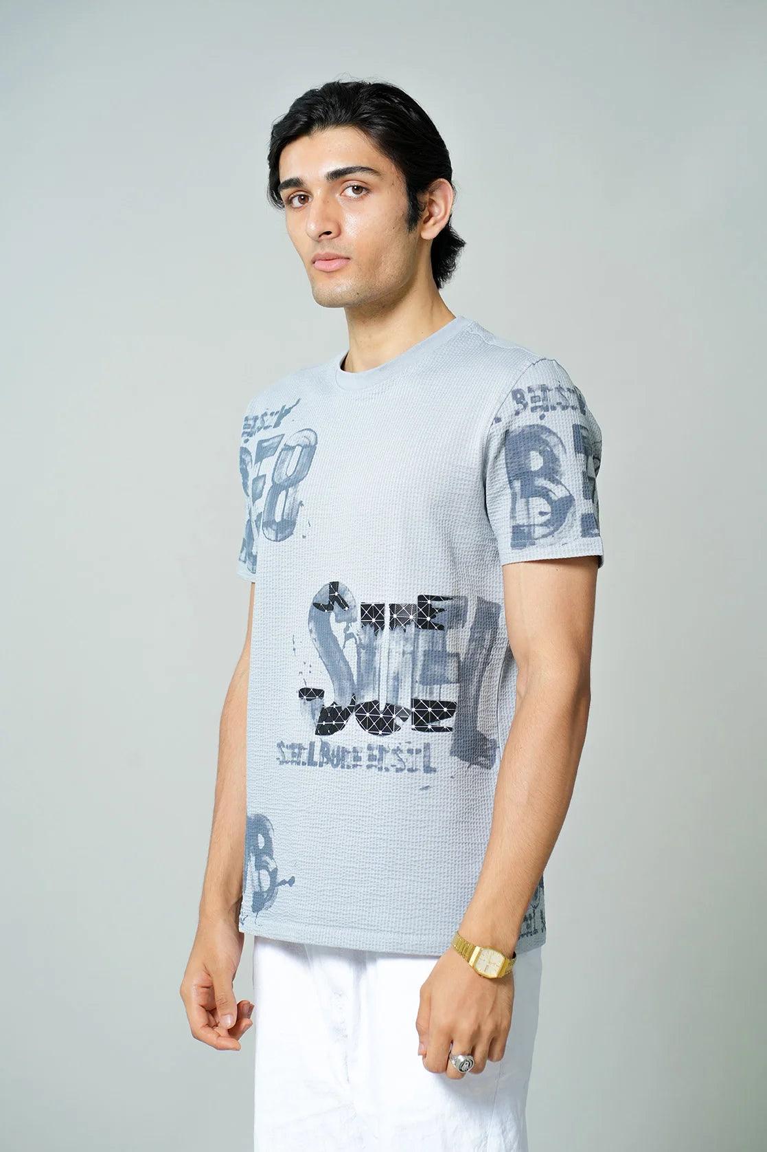 Experience unbeatable style and comfort with Fort Collins Men's Sky Blue Structured Cotton-Lycra T-shirt, featuring a modern print design. This round-neck t-shirt is currently available for purchase online in India.