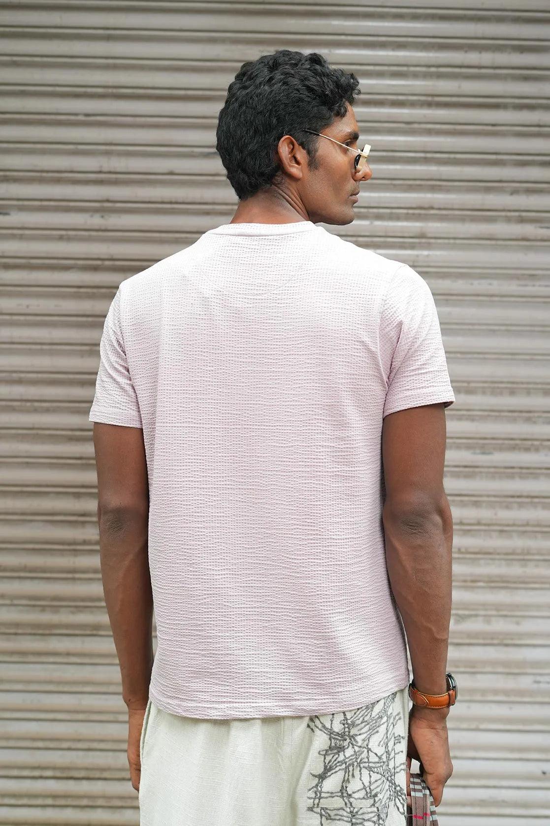 Offered is a Men's Structured Fabric Solid Lavender Round Neck T-Shirt from Fort Collins, featuring a Chest Logo.