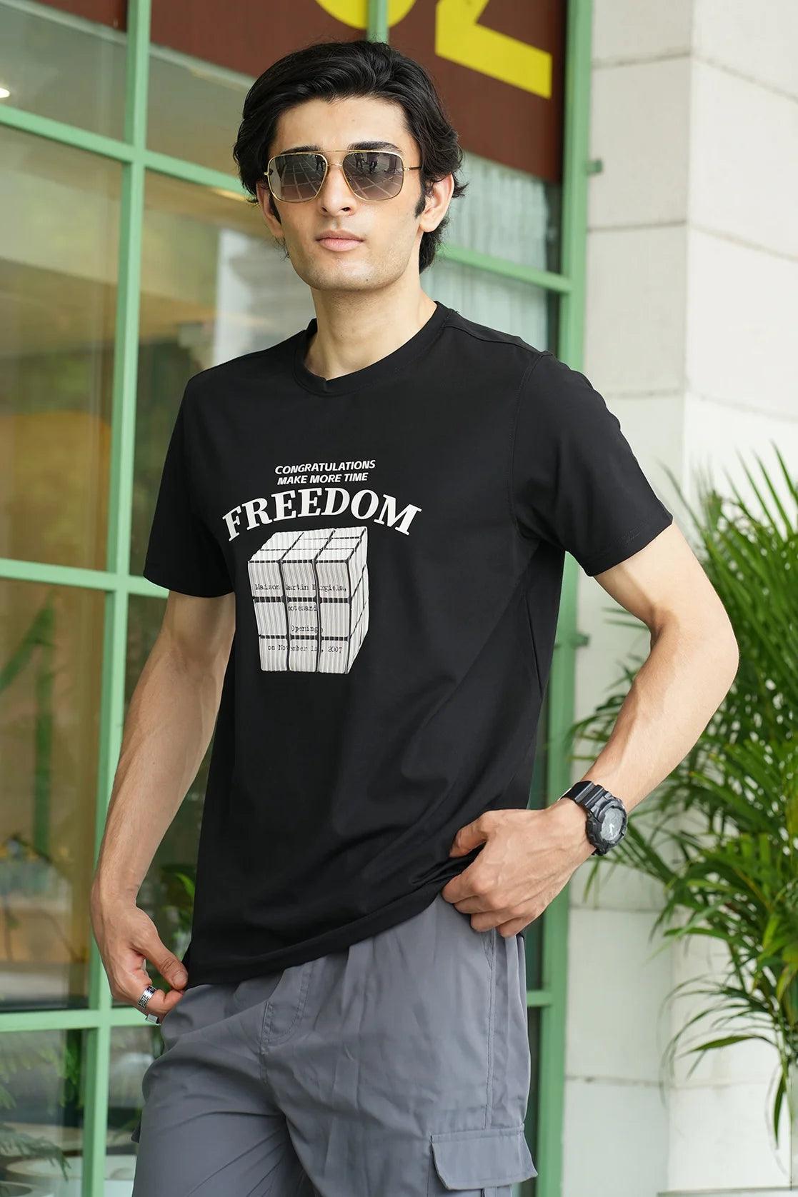 Elevate your wardrobe with Fort Collins' Men's Black Stretchable T-Shirt featuring an Embossed Freedom Graphic. Buy online now in India for a stylish upgrade.