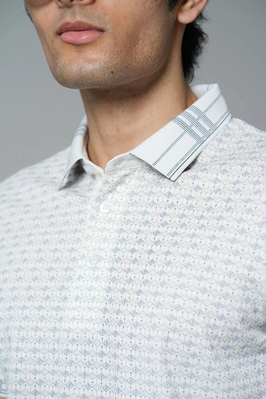 This Fort Collins men's t-shirt features a classic white color and a stylish all-over geometric print on the polo collar. Shop now for this must-have piece, available exclusively online in India.