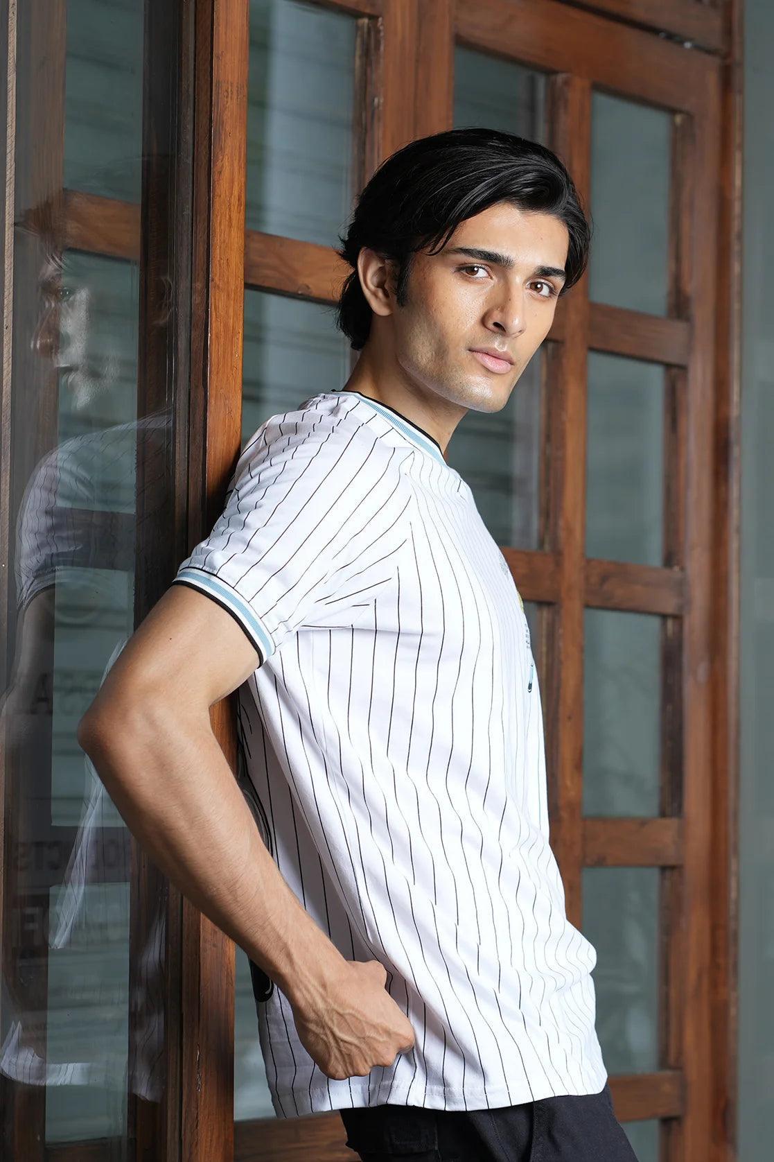 Upgrade your wardrobe with the Fort Collins Men's White with Black Pinstriped Cotton-Lycra T-shirt, available to order online from anywhere in India. This stylish and versatile shirt is the perfect addition to any fashion-savvy individual's collection.