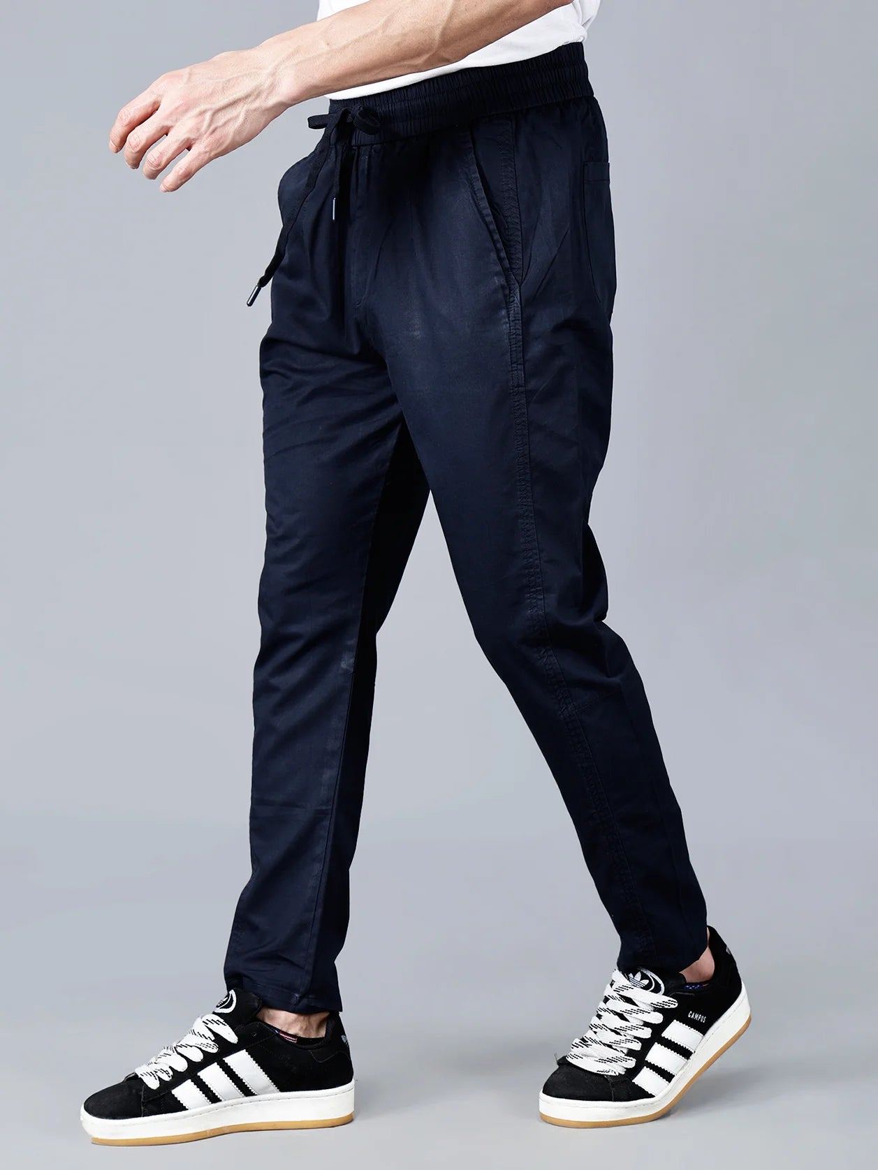 Shop now online for Fort Collins men's dark navy cotton track pants with smart taper fit, elastic waistband, and multi-pocket design. Perfect for lounging, travel, or daily use, these stylish and breathable pants are a must-have for any man. Available for purchase in India.