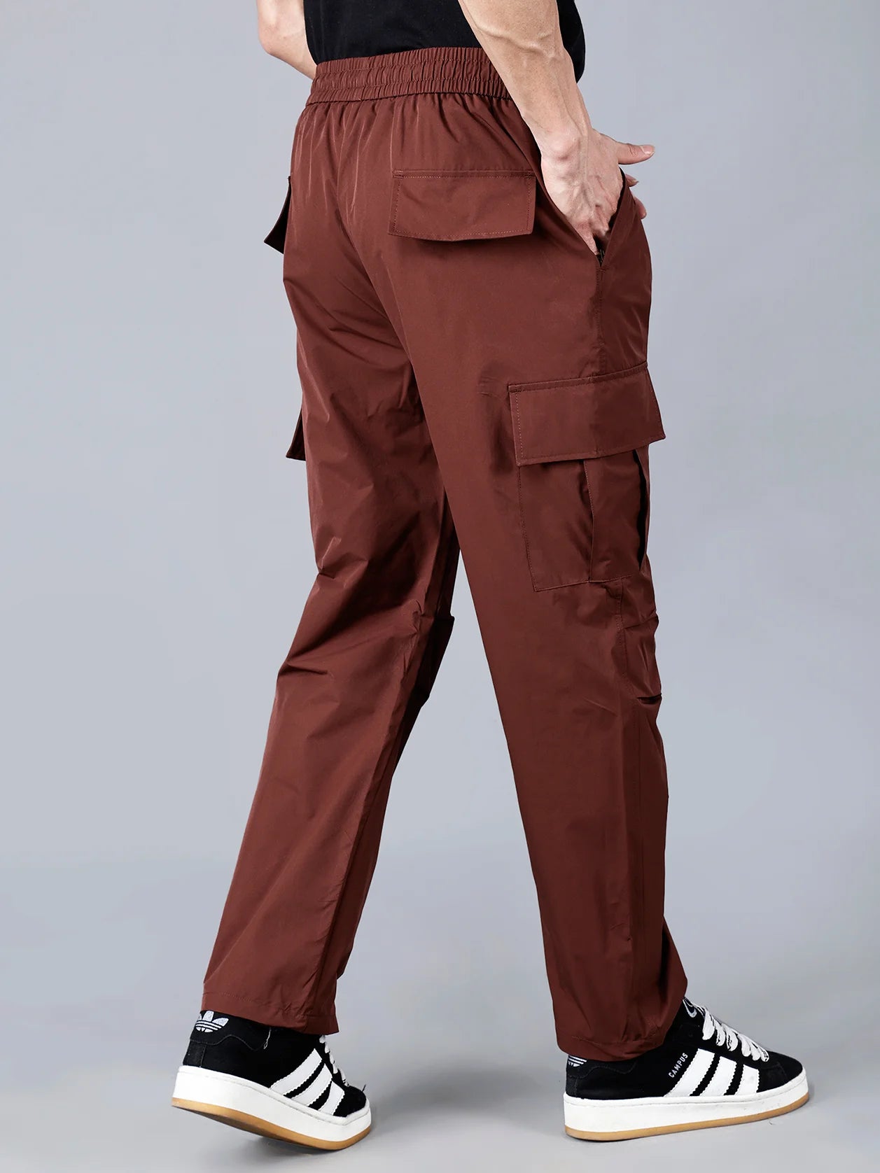 Explore the wine cargo track pants for men, designed by Fort Collins with a relaxed fit, practical utility pockets, and durable ripstop fabric. Perfect for the gym, traveling, or casual streetwear, available for purchase from our online store in India with nationwide delivery.