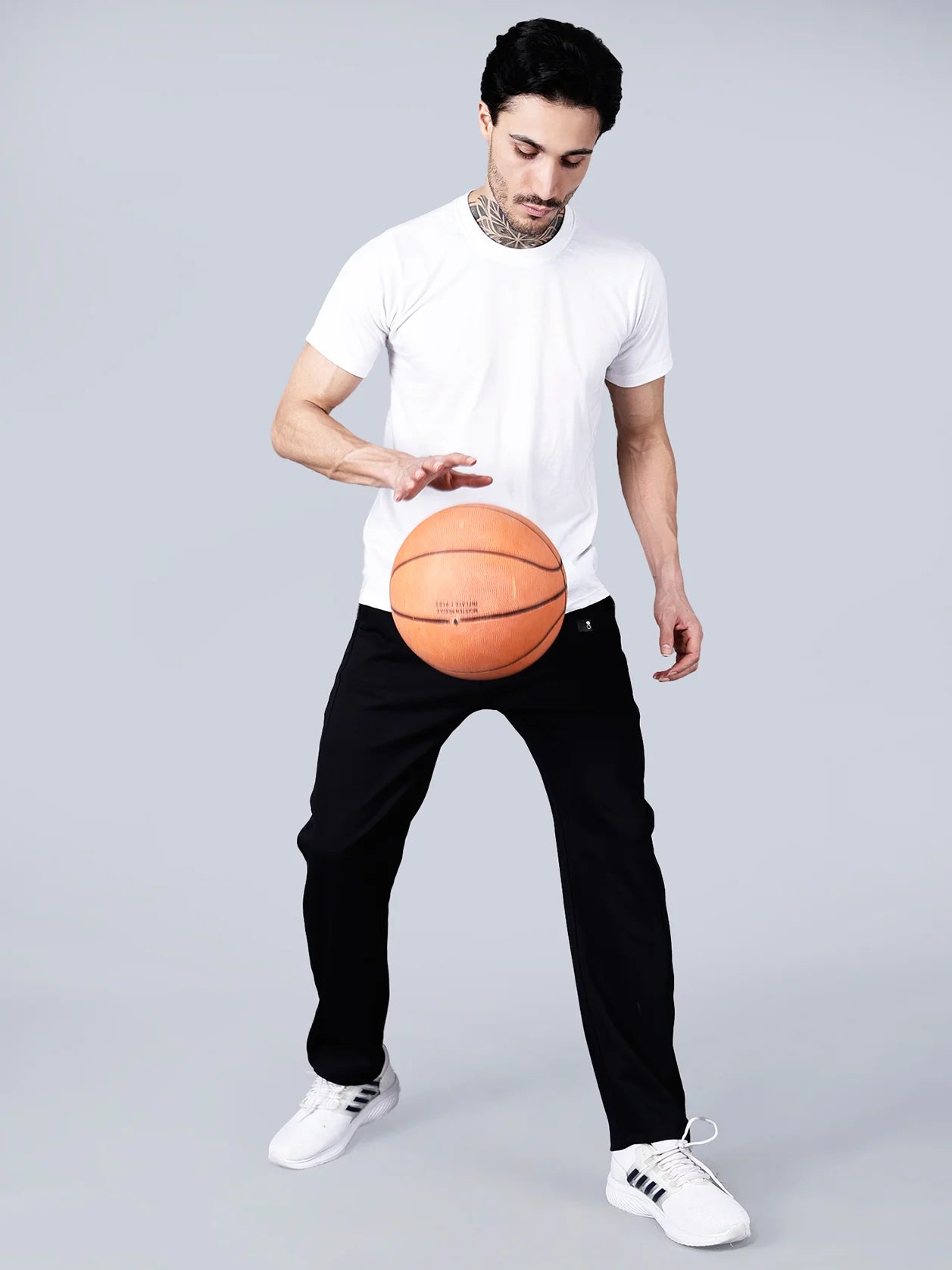 Elevate your style with these sleek black cotton track pants for men from Fort Collins. The smart taper fit, elastic waistband with drawstring, and practical pocket design provide both fashion and functionality. Order now to add this trendy track pant to your wardrobe.