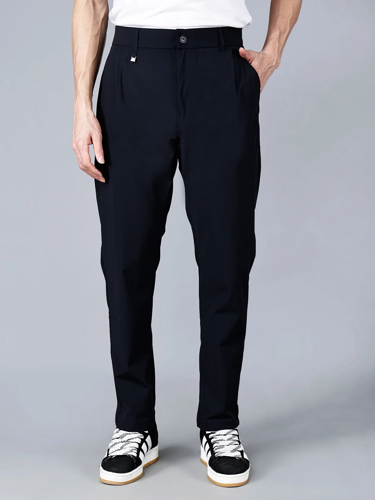 Fort Collins slim fit black trouser for men with stretchable fabric, elastic waistband, and a modern design—perfect for stylish everyday wear. Shop now online for a trendy wardrobe from anywhere in India.
