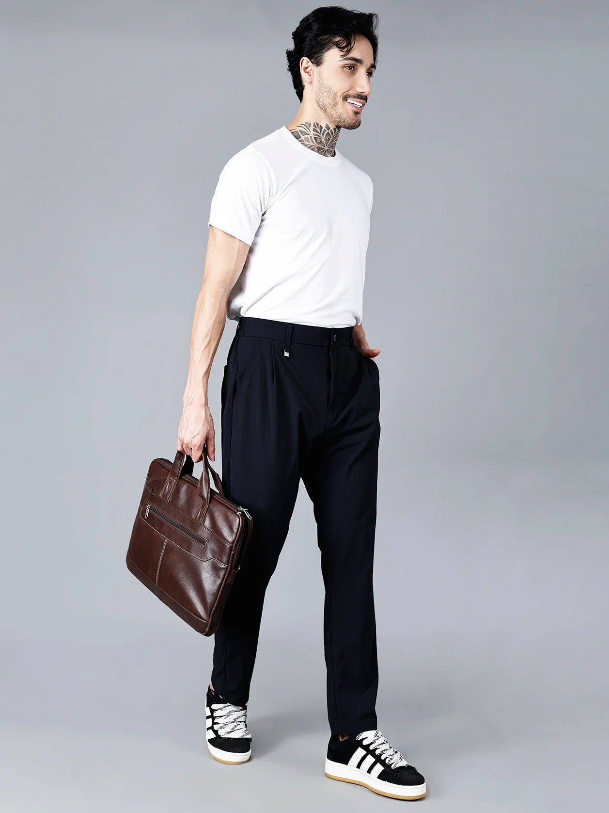 This Fort Collins men's slim fit black trouser feature stretchable fabric, an elastic waistband, and a modern design, making them the ideal choice for stylish everyday wear. Shop now to enhance your wardrobe with the latest trends, available for purchase online from anywhere in India.