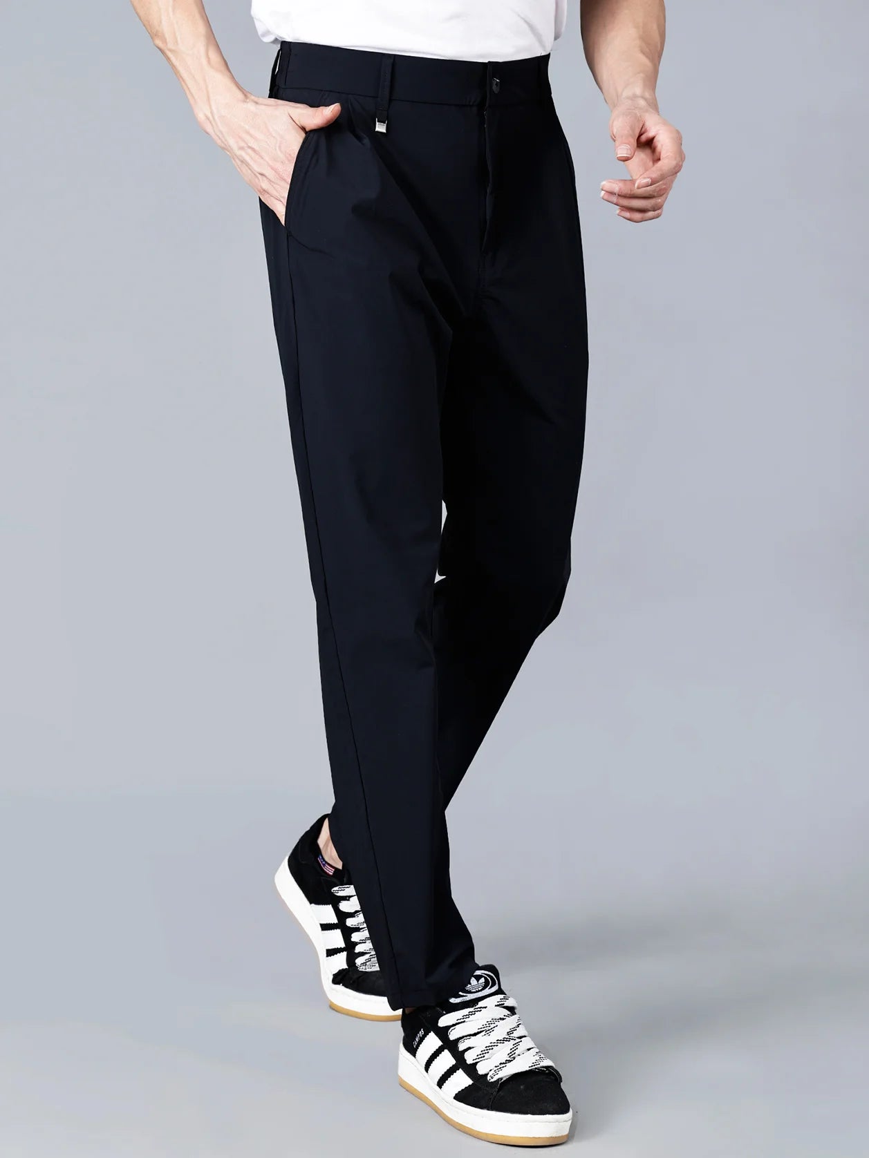 Upgrade your clothing collection with the Fort Collins slim fit black trouser for men. Made with stretchable fabric and featuring an elastic waistband, this modern design is perfect for stylish everyday wear. Shop now online from anywhere in India and elevate your fashion game!