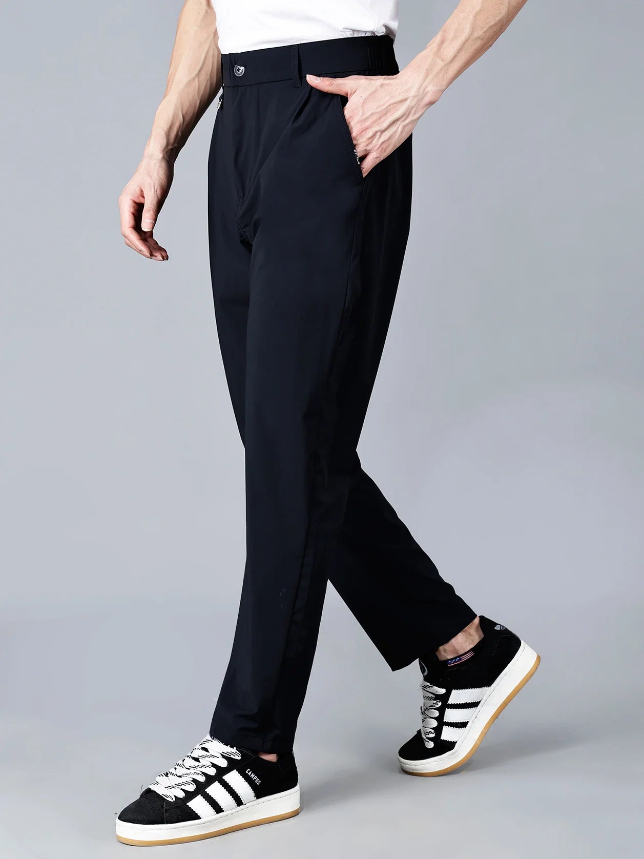 Upgrade your wardrobe with the Fort Collins black slim fit trouser for men, featuring a modern design, stretchable fabric, and an elastic waistband. Order now to elevate your everyday style with this fashionable piece, available for online purchase in India.
