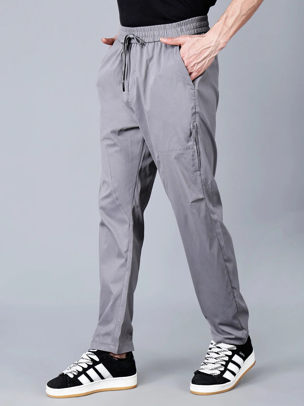 Fort Collins grey cargo track pants for men with zippered side pocket, perfect blend of comfort, style, and utility for everyday wear or workouts. Shop now online for a trendy clothing from anywhere in India.