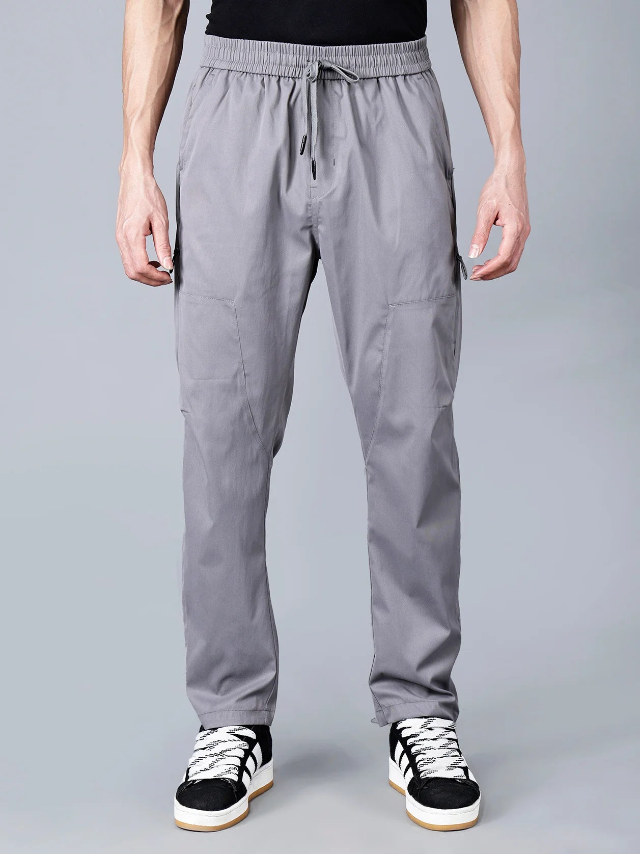 Discover the ideal combination of comfort, style, and practicality with these Fort Collins men's cargo track pants. Featuring a zippered side pocket, these pants are perfect for all-day wear or workouts. Buy online now for this fashionable piece from anywhere in India.