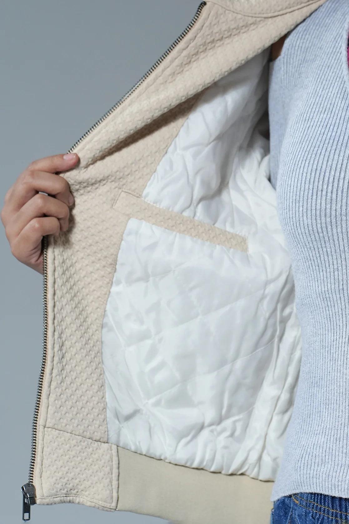 Discover a stylish and versatile wardrobe staple with the Women’s Beige Structured Fabric Jacket with Quilted Lining by Fort Collins. Shop now and upgrade your fashion game from anywhere in India.